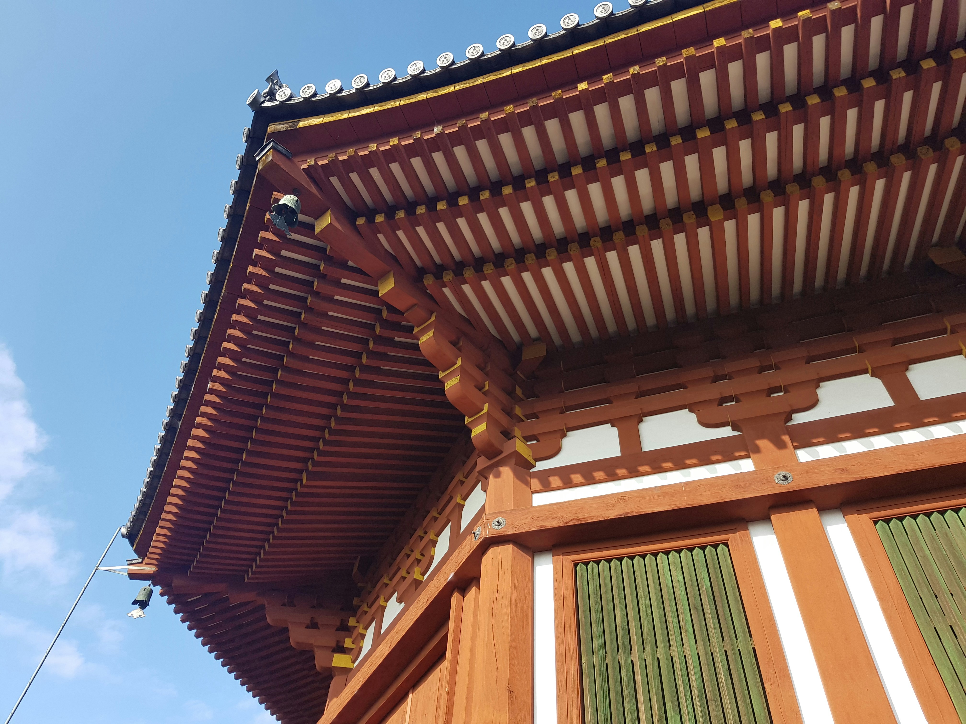 Detail beneath of the roof of a pagoda in the complex of the golden temple in Nara, Japan